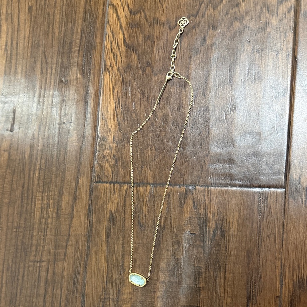 Kendra Scott gold necklace with opal gem